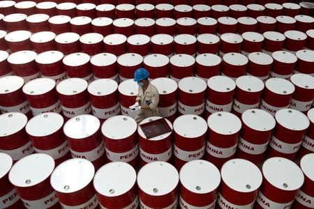 Oil prices rise on demand optimism; US inventory build surprise