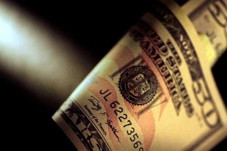 Dollar gains ahead of Powell testimony; euro stabilizes