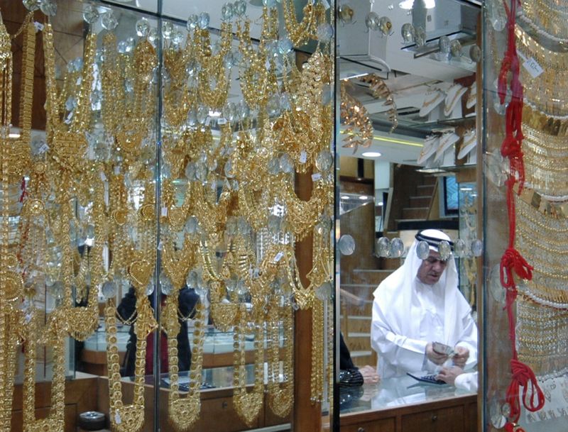 Gold on track for monthly gain on Mideast fears, Fed rate-cut hopes