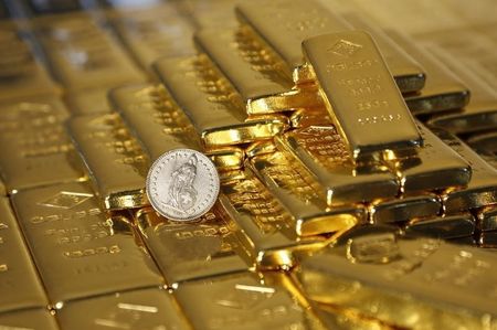 Gold prices rise, close to record highs as rate cut bets mount