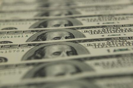 Dollar hands back some gains; Jackson Hole looms large