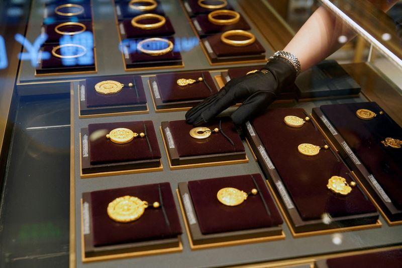 Gold slips on firmer dollar, US inflation data in focus