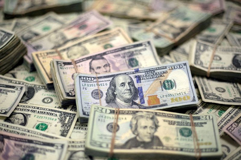 US dollar slips in choppy trading