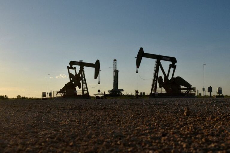 Oil little changed as IEA surplus forecast offsets rate cut optimism