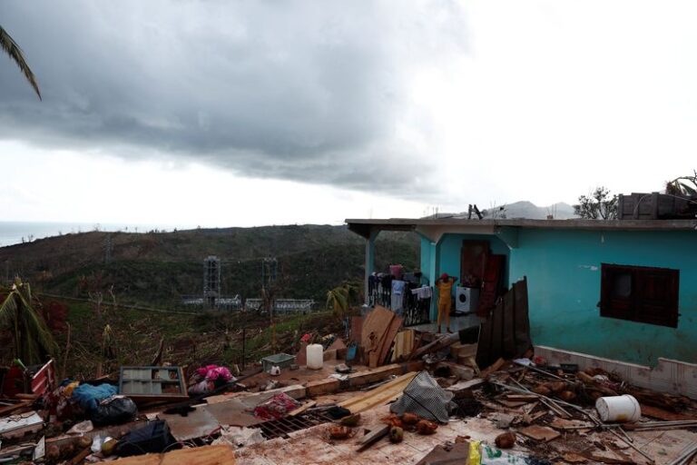 France’s Macron arrives in cyclone-battered Mayotte as heavy rains hit islands