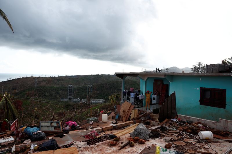 France’s Macron arrives in cyclone-battered Mayotte as heavy rains hit islands